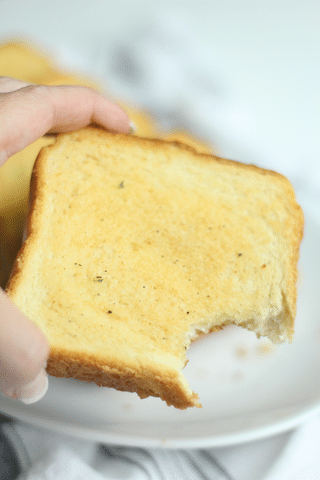 Texas Toast Garlic Bread with bite taken out