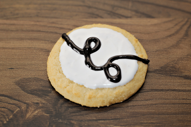 sugar cookies with white icing, gel icing 