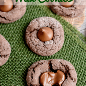 chocolate cake mix cookies with hershey kiss on green tray and text