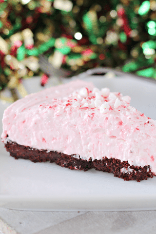 peppermint cheesecake with oreo crust and christmas background