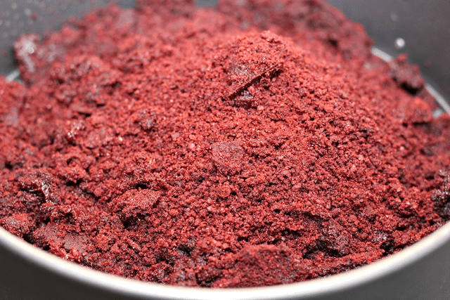 crumbled red velvet oreos in bowl