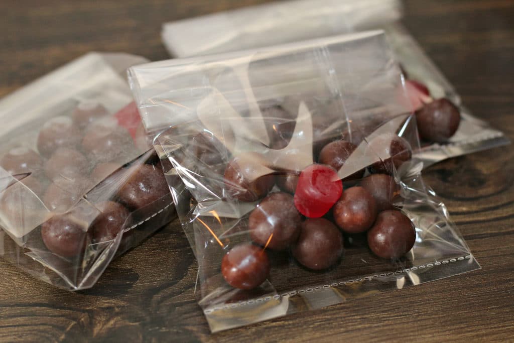 whoppers,red dot candy in treat bag