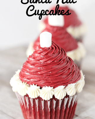 red velvet cupcakes with white and red icing and text