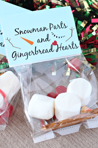 marshmallows, pretzel sticks, candy corn, red dots, snowman parts label