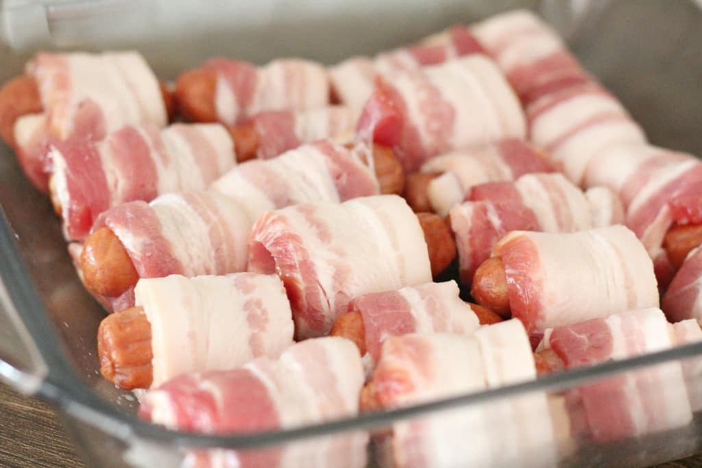 bacon wrapped smokies in a pan