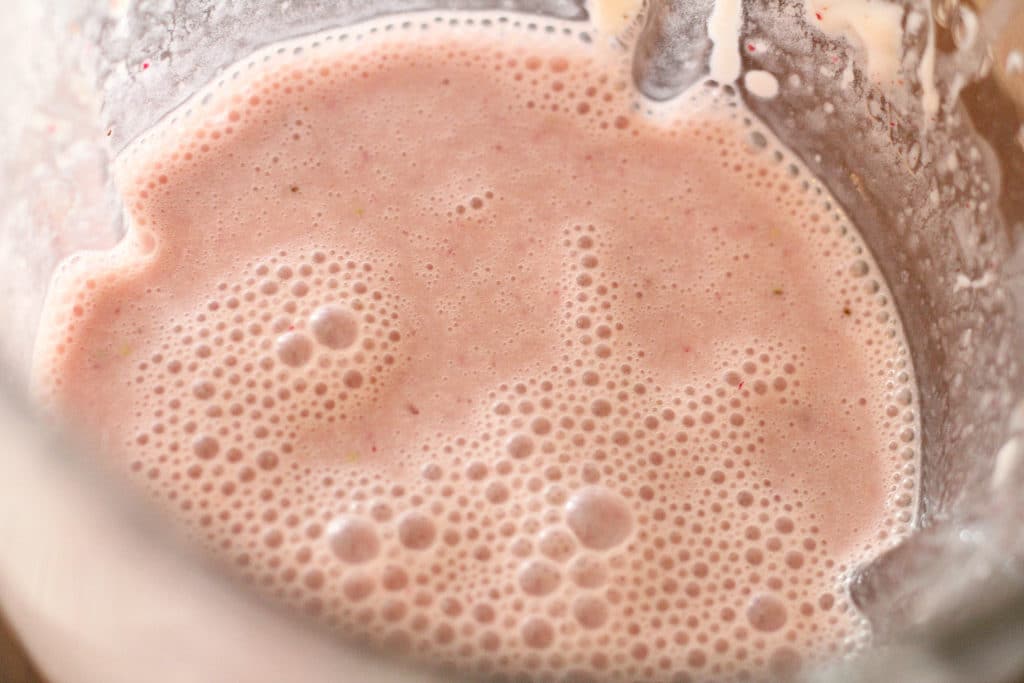 strawberry smoothie in a blender