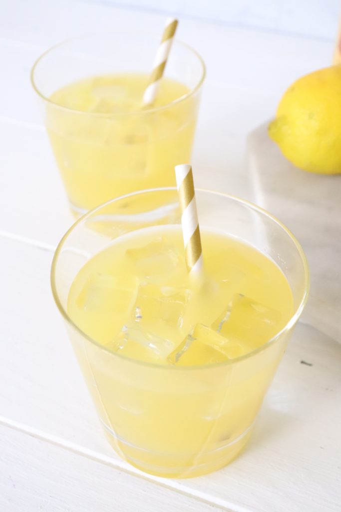 glass of lemonade with a straw