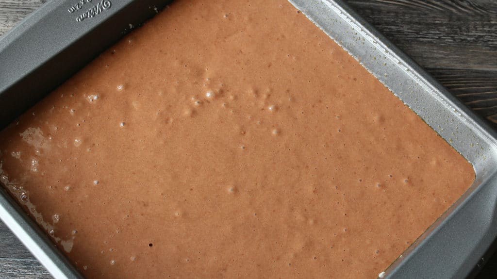 chocolate cake in a cake pan for earthquake cake