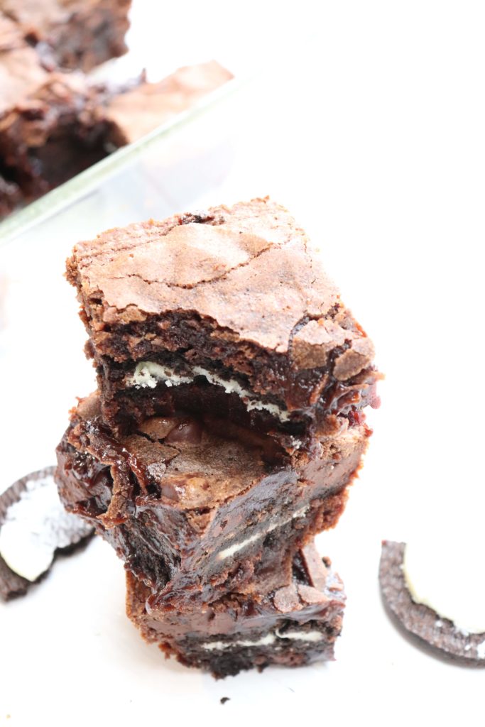 oreo brownies stacked with a bite missing