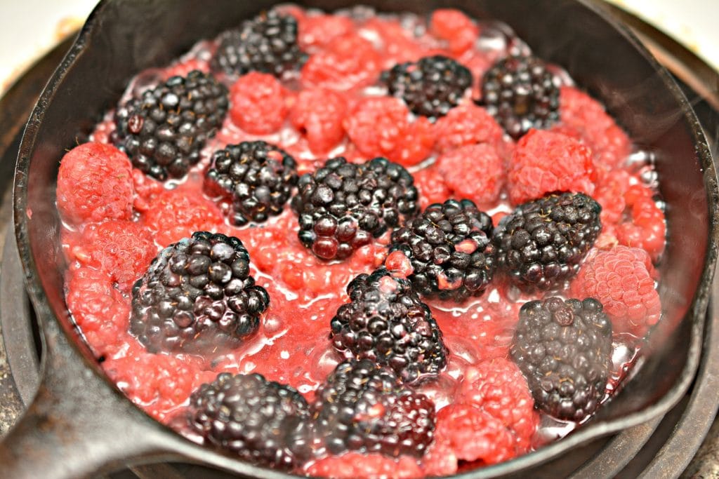 blackberry cobbler berries in a pan