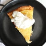 overhead shot of egg custard pie with whipped cream