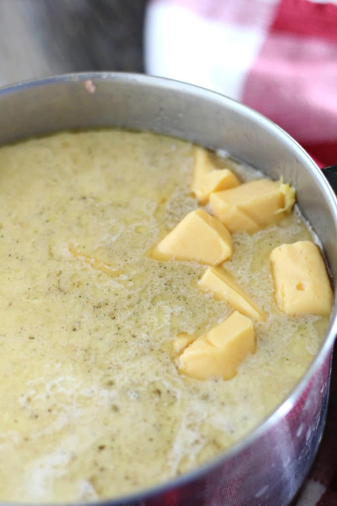 soup broth with cheese