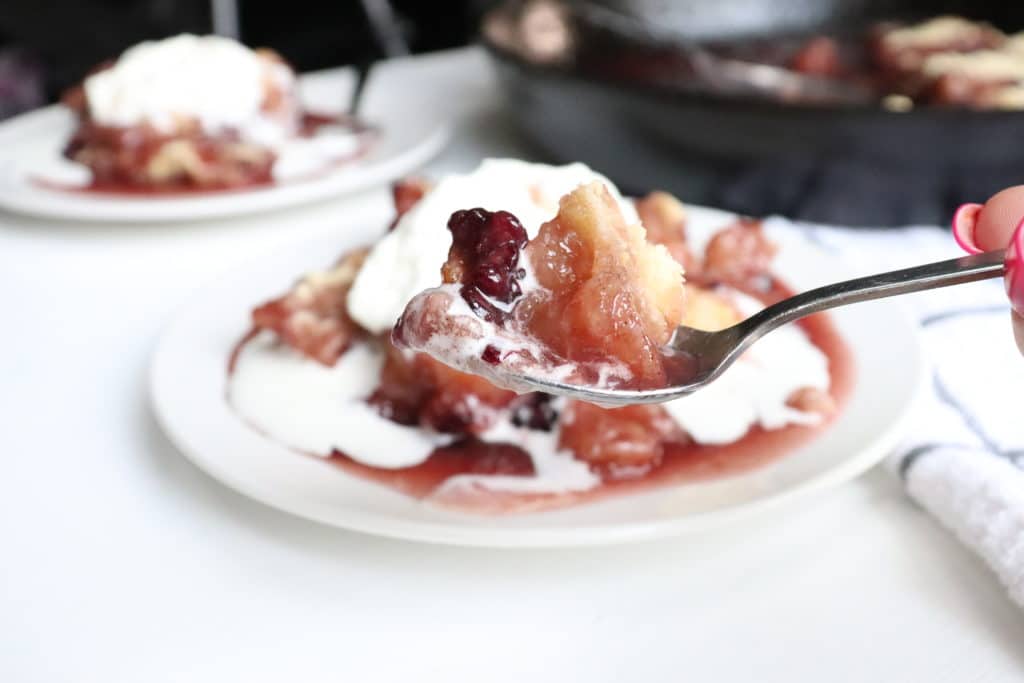 blackberry crisp on a spoon