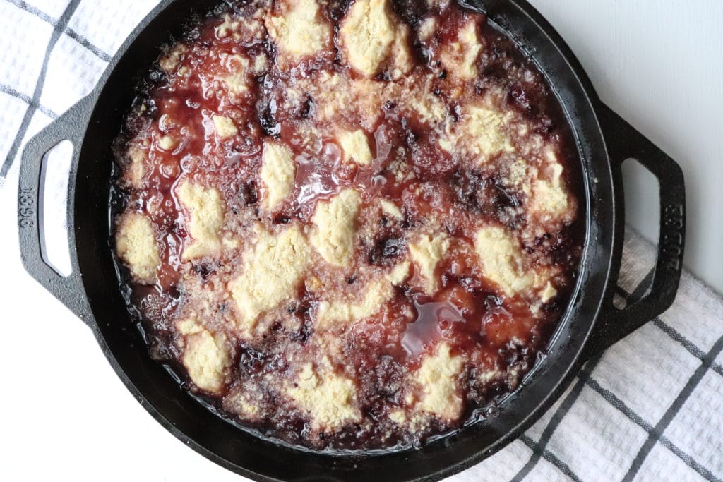 blackberry crisp in a cast iron pan