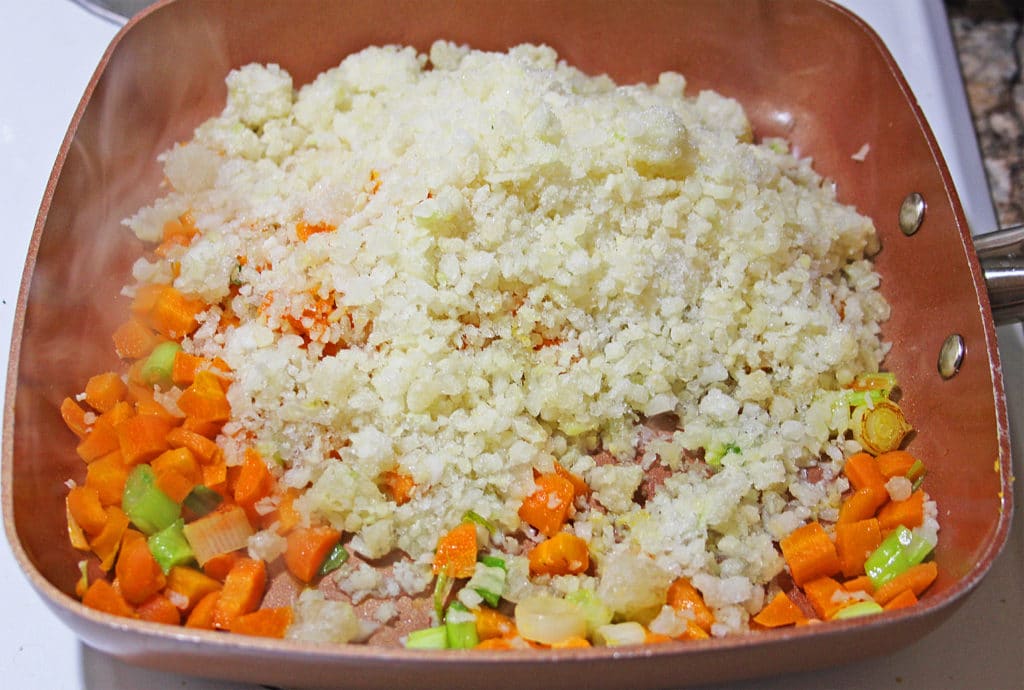 cauliflower in skillet with veggies