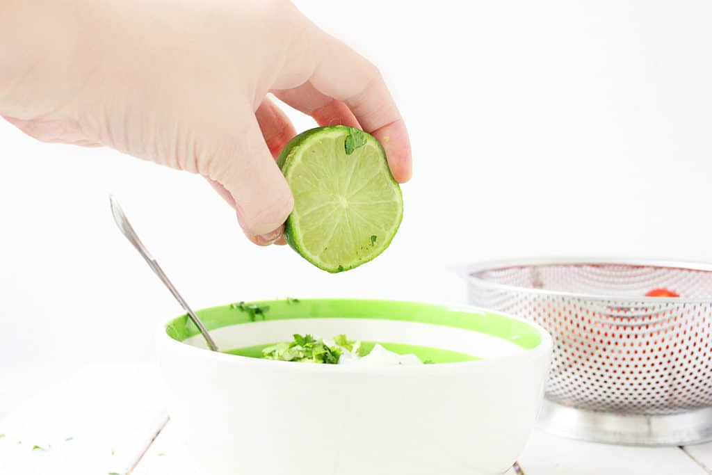 add lime to the stuffed tomato mixture