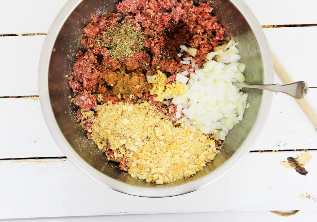 place all the meatloaf ingredients in a bowl