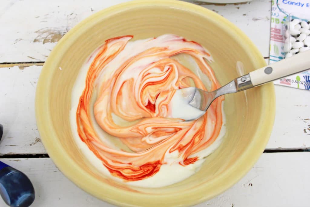 melted white chocolate with orange coloring