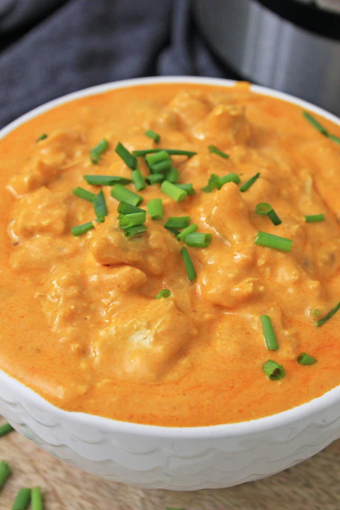 buffalo chicken dip in a white bowl