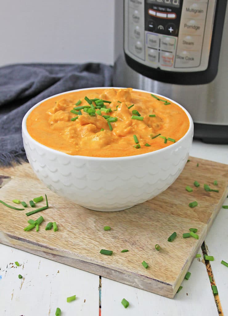 buffalo chicken dip in a white bowl