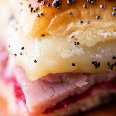 close up of hawaiian sweet roll ham and cranberry sliders
