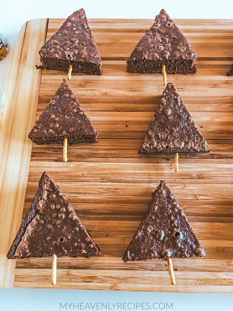 Christmas tree made from chocolate biscuit cake. Brownie shape new year  trees on dark stone background. Holiday Cooking concept. Top view Stock  Photo - Alamy