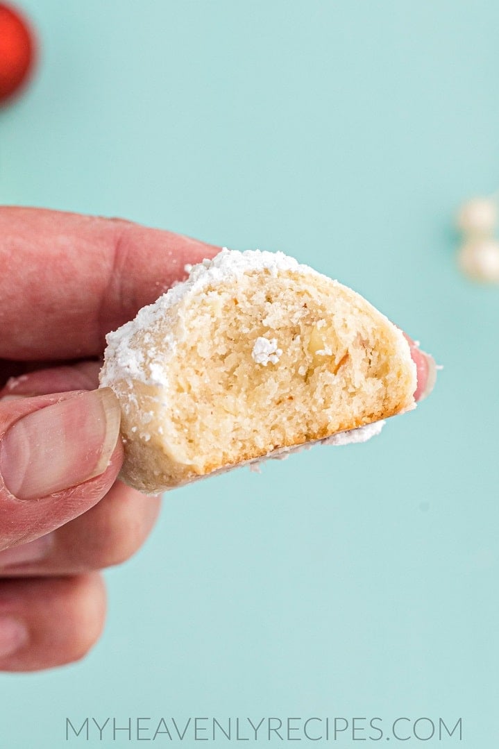 holding snowball cookie