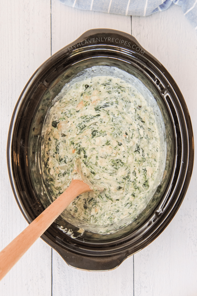 https://myheavenlyrecipes.com/wp-content/uploads/2020/12/crockpot-spinach-artichoke-dip-recipe-2-683x1024.png