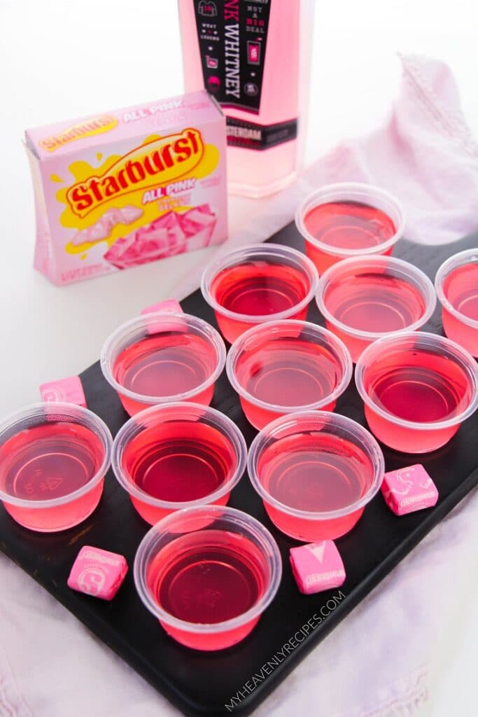 https://myheavenlyrecipes.com/wp-content/uploads/2021/07/pink-starburst-jello-shots-683x1024.jpg