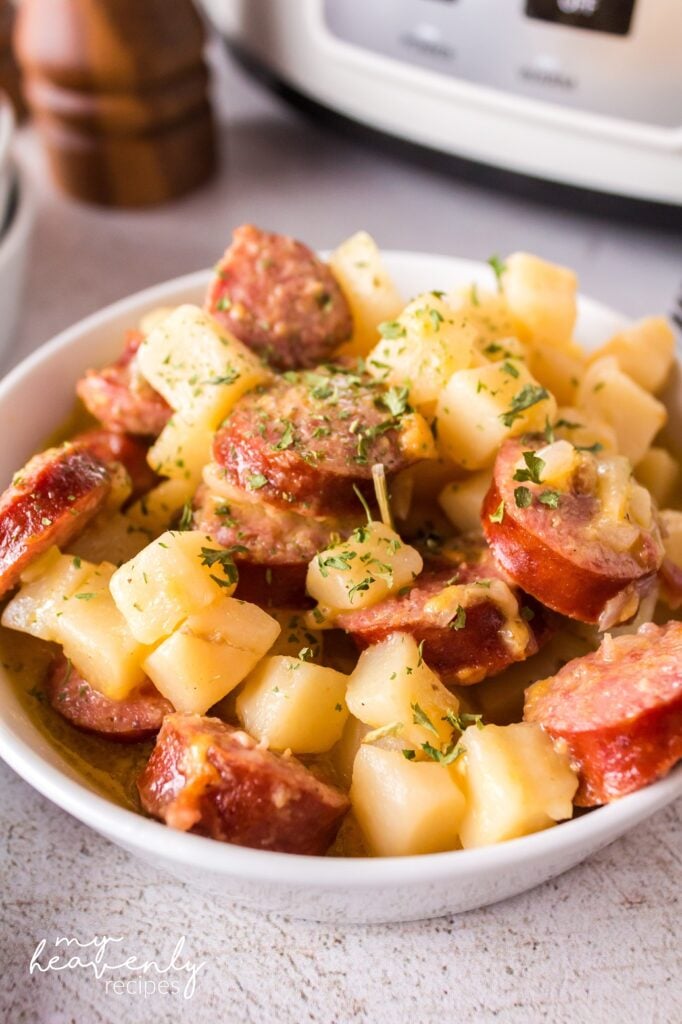 https://myheavenlyrecipes.com/wp-content/uploads/2022/10/cheesy-potato-kielbasa-crockpot-682x1024.jpg